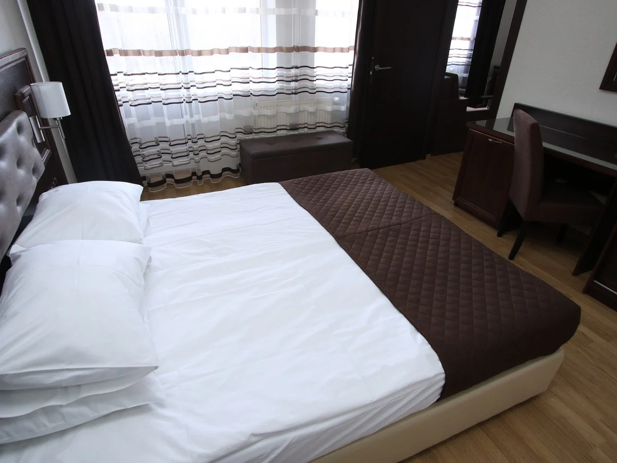 Спальня номера Люкс у Bayka SPA & Resort